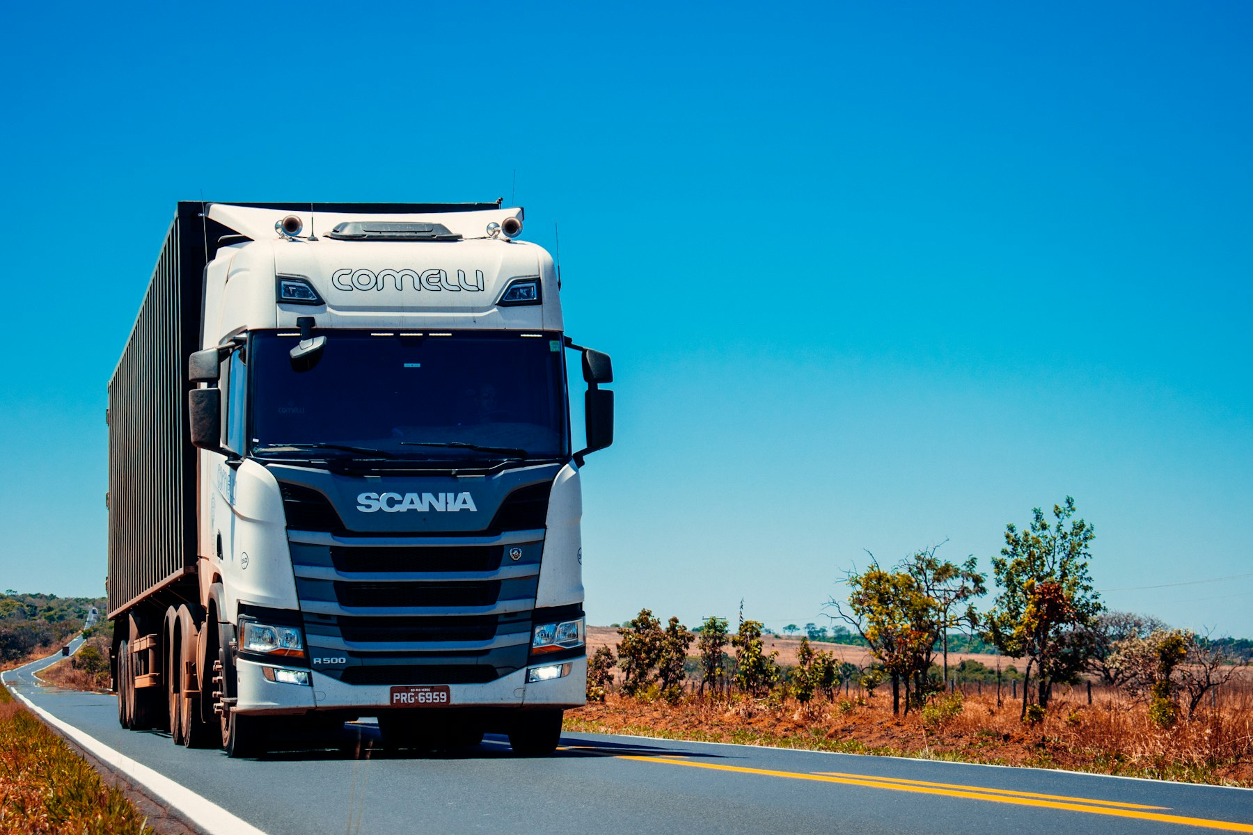 Semi trucks on a highway representing live fleet operations
